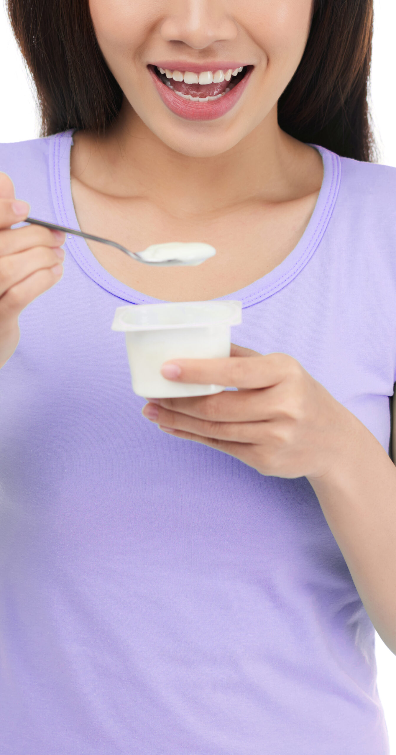 Smiling Woman Eating Yogurt